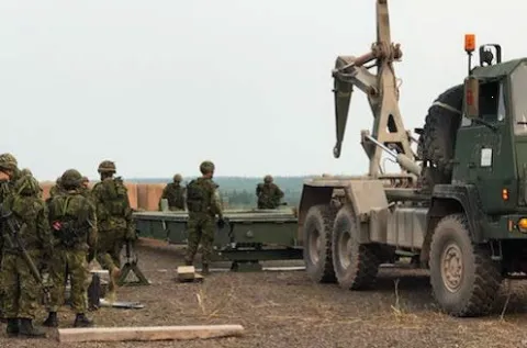 Members of 24 Reserve Troop rehearse bridge construction on Ex MAROON RAIDER 2018