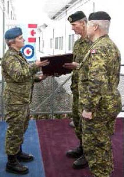 BGen Delauriers presents CME Book of Remembrance to Chief Engineer 27 Feb 2014