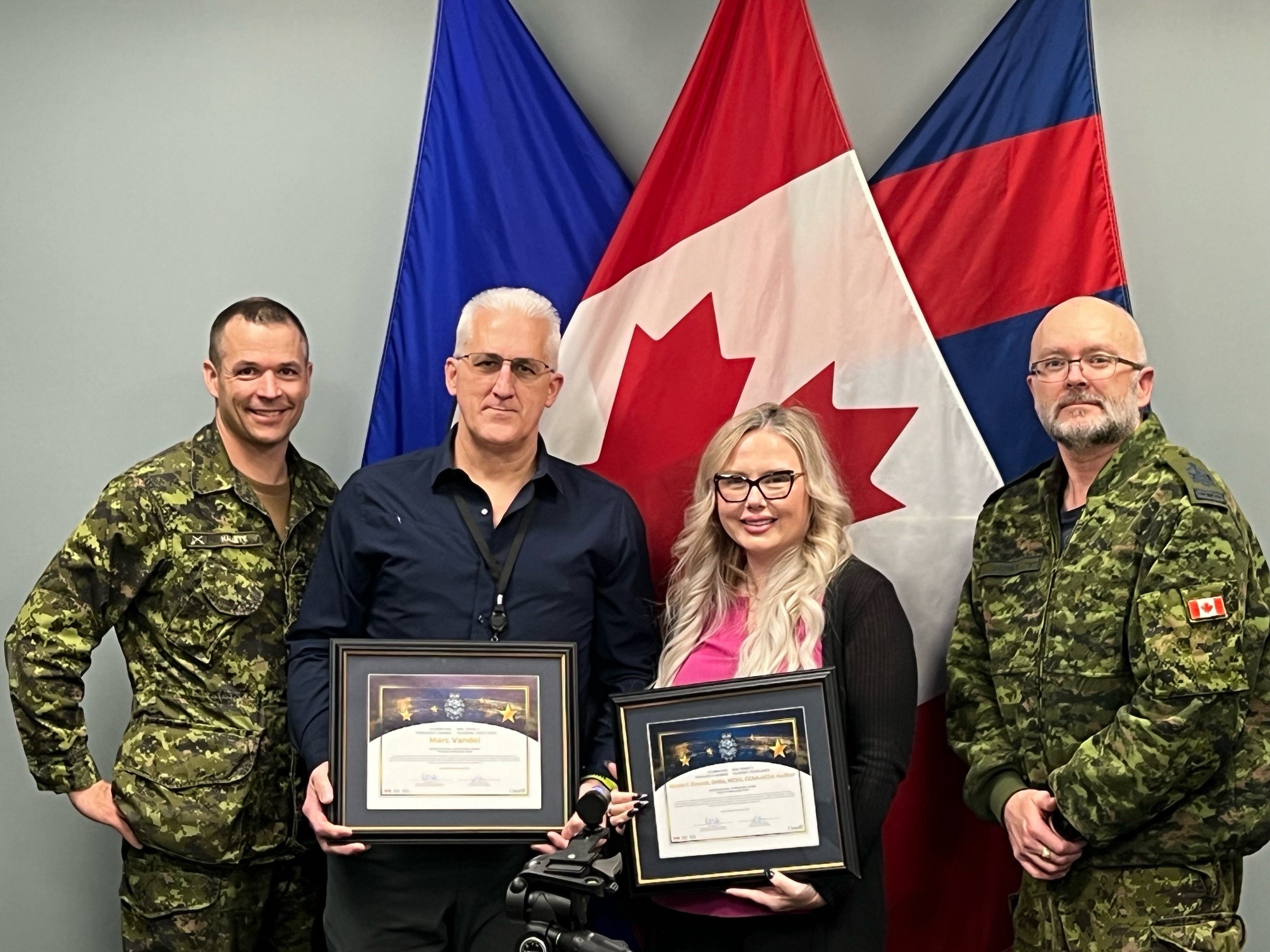 Celebrating Excellence Award – (L-R) LCol Johnathan Hallett, CO RPOU(W), RPOU(W) Compliance Officer, Marc Vandal, and Nicole Warren, RPOU(W) RSM, CWO Eric Barney during the award presentation.