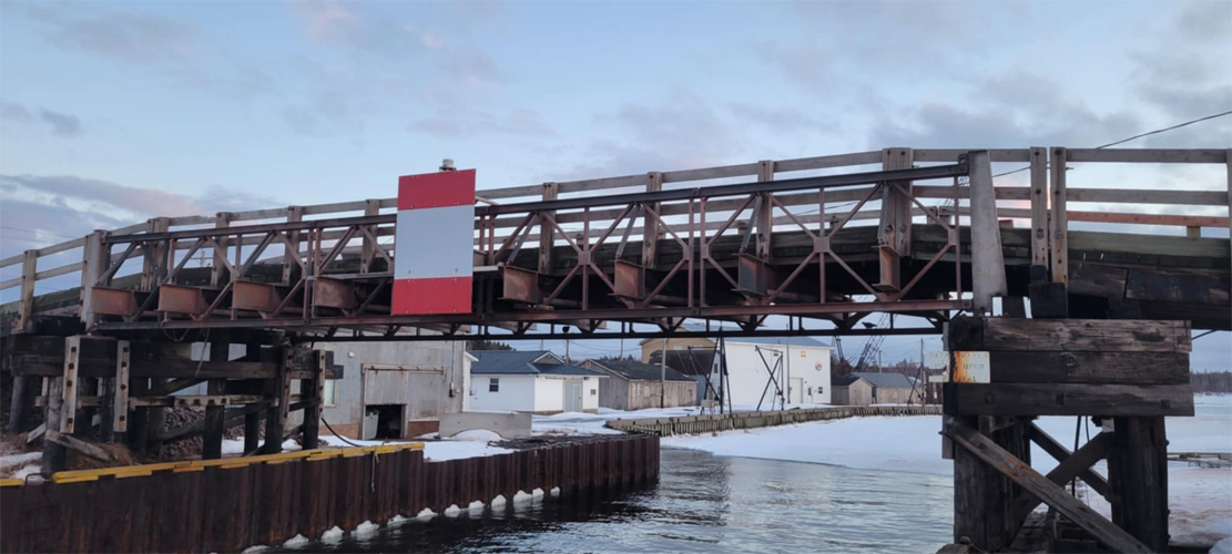 The Bailey Bridge crosses the Naufrage River as it goes out to sea. 