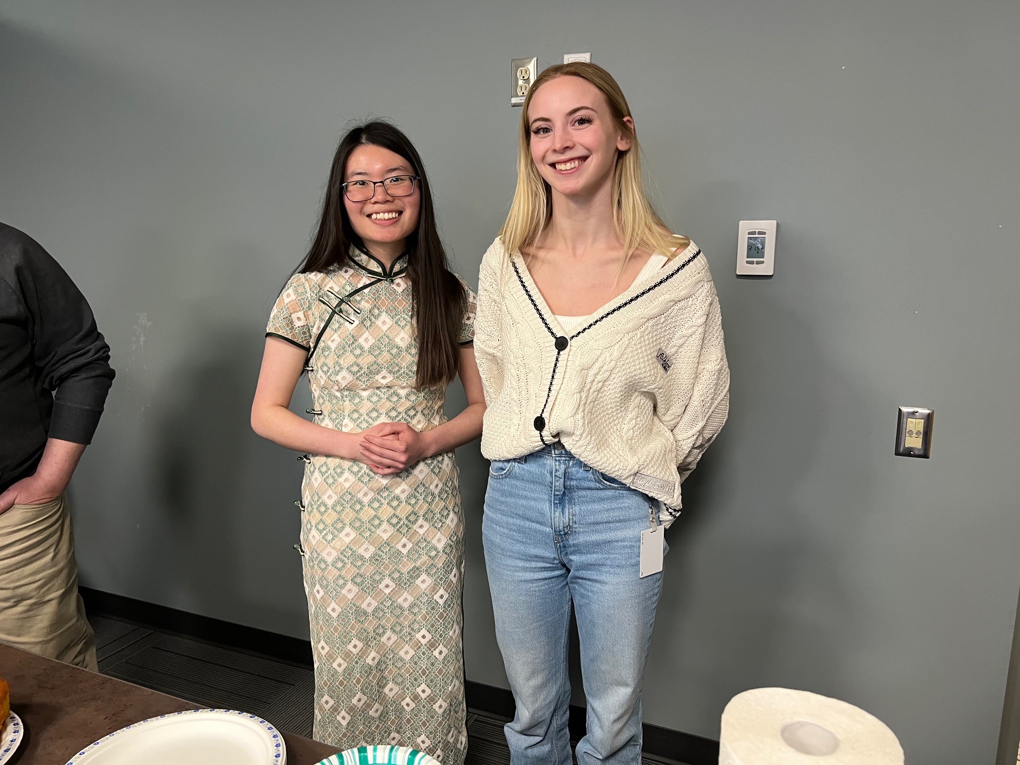Vansa Chang, Sustainability Coordinator (Engineering Student) wearing traditional Chinese dress “Qipao” and Kendra Cooper, RPOU(W) Administrative Officer are celebrating Asian Heritage Month
