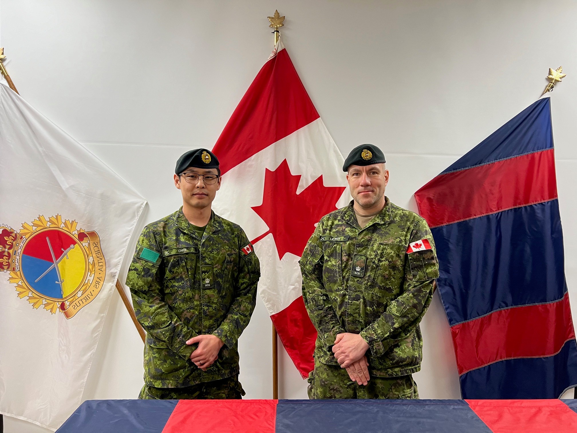 New mbrs in RPOU – (L-R) Maj Esli Choi, incoming OC Detachment Chilliwack RPOU(P), Maj Vincent Leroy, incoming DCO RPOU(Q) 