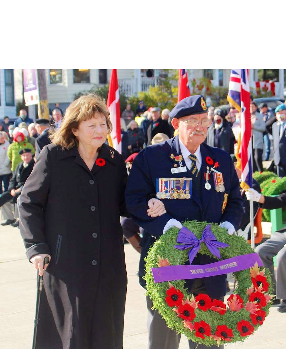 Raylene McKinnon lays a wreath during the 2021 Remembrance Day ceremonies in North Sydney, NS on behalf of Silver Cross mothers.