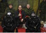The divers of 5 CER: Capt Kilburn and Cpl Plourde; second row: Col Lafaut, Comd 5 CMBG; The Honourable Steven Blaney; BGen Giguère, Comd LFQA/JTF(E); standing: LCol Levasseur, CO 5 CER