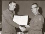 BGen St. Aubin presents Scroll to Marvin Johnston on promotion to CWO 1976