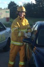 Our Col Cmdt BGen DesLauriers breaking car windows. // Notre Col Cmdt, le Bgén DesLauriers, brise des fenêtres d’auto.