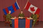 BGen R.W. DesLauriers, OMM, CD, BGen J.S. Sirois, and BGen S.M. Irwin signing the change of appointment certificate // Bgén R.W. DesLauriers, OMM, CD, Bgén J.S. Sirois, et Bgén S.M. Irwin signent le parchemin officiel de la passation