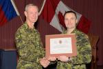 BGen J.S. Sirois presents BGen DesLauriers with a CME Branch Commendation 