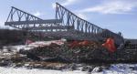 The new bridge is launched across the Battle River // Le nouveau pont enjambe la rivière Battle.