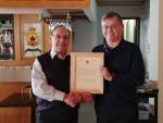 Dennis Dwyer receives Letter of Appreciation from Dan O'Keefe representing the Edmonton Chapter of the CMEA