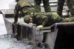 Reserve combat engineers were given hands-on training in bridge building during Exercise PALADIN RESPONSE. The medium raft or medium floating bridge is assembled on water and once the pieces are secure, it can be used to ferry large military vehicles from the water to land. - Photo: Sgt Greg Gorecki/41 CER