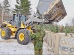 Photo 2 Combat Engineers soldiers fill hesco barriers at a Vehicle Inspection Point du ring Ex MATTAWA SAPPER, Nov 18