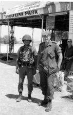 Sergeant Tom Walton of 1 AB Fd Sqn (centre) converses with a Turkish soldier guarding Greek prisoners during ceasefire negotiations in July 1974. Sergeant Tom Walton of 1 AB Fd Sqn (centre) converses with a Turkish soldier guarding Greek prisoners during ceasefire negotiations in July 1974.