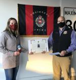 LCol Marc Comeau, CO 1 Engineer Support Unit and President of the CMEA KIngston Chapter presenting the CMEA MCpl M.R. Isfeld Memorial Bursary