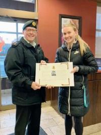 LCol Sylvain Neveu, President of the NCR Chapter, presents CMEA Bursary Scroll to winner Lauren Gale, a student at Algonquin College, Ottawa.