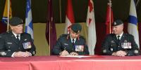 CWO Mark Baisley (RCR) hands appointment to CWO Shawn Croucher (RCE) - Photo by MCpl Robert LeBlanc CWO Mark Baisley (RCR) hands appointment to CWO Shawn Croucher (RCE) - Photo by MCpl Robert LeBlanc
