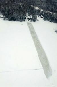 Aerial view of the ice bridge created by 35 CER engineers. // Une vue aérienne du pont de glace créé par les ingénieurs du 35 RGC.  (Photo: Maj Simon Germain)