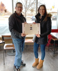 LCol Sylvan Neveu, President of the NCR Chapter, presented the Col Edward Churchill OC, CD CMEA Bursary of $2,000 to Audrey Quiron, daughter of LCol Eric Quiron, (Ret'd). Audrey is studying Life Sciences at Queen's University.