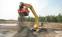 Sifter bucket aerating petroleum hydrocarbon impacted soil at the Survival Tank Farm site at CFB Goose Bay, NL