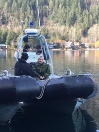 HCol Baker-MacGrotty is briefed on the RHIB before taking a test-drive
