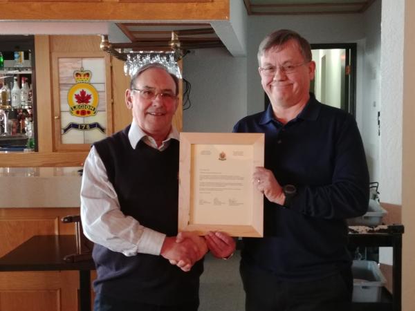 Dennis Dwyer receives Letter of Appreciation from Dan O'Keefe representing the Edmonton Chapter of the CMEA
