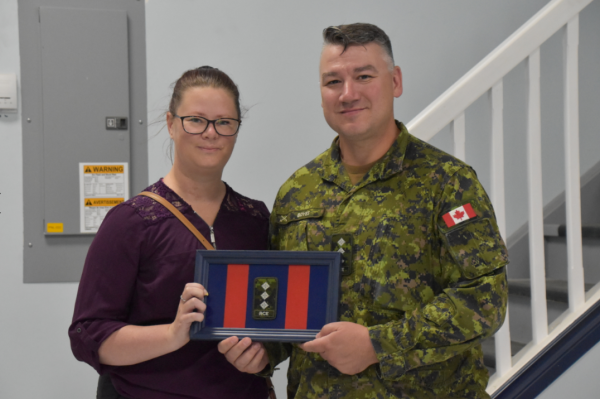Captain Bryon Boyes with his spouse, Nicole Boyes.