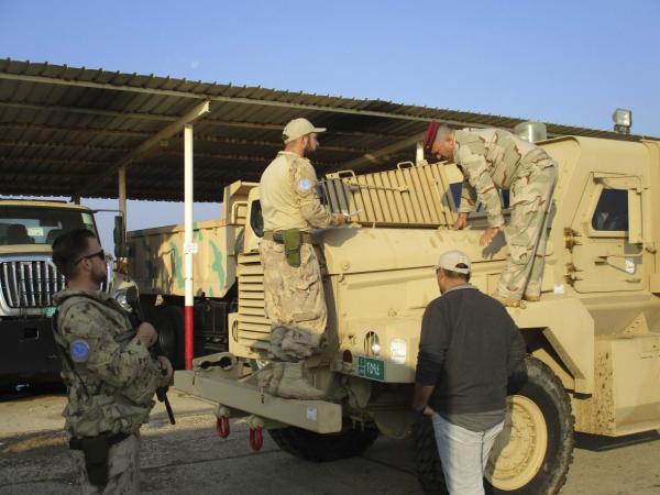 A member of the Iraqi security forces, under supervision of a Canadian Armed Forces instructor with the Route Clearance Package Training Team, conducts vehicle maintenance on the “Badger” – a military vehicle used to investigate possible IED’s after an initial screening in northern Iraq, November 2018. Photo: Op IMPACT Imaging