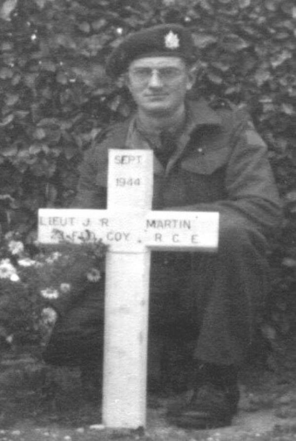 Rifleman Arthur Martin at his brother's grave at Elst in Holland