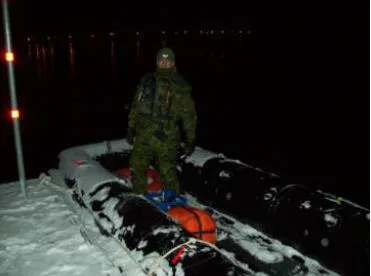 Cpl Therrien ready to load an infantry section into an assault boat.