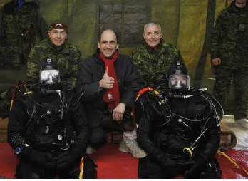 The divers of 5 CER: Capt Kilburn and Cpl Plourde; second row: Col Lafaut, Comd 5 CMBG; The Honourable Steven Blaney; BGen Giguère, Comd LFQA/JTF(E); standing: LCol Levasseur, CO 5 CER