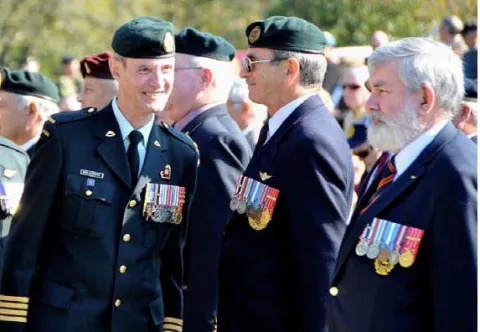 Col Comdt speaks with CWO Bob Frigon (Ret’d)