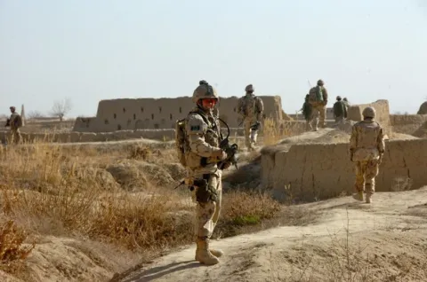 Brigadier-General Jennie Carignan, as the commanding officer of Task Force Kandahar Engineer Regiment patrols in Nakhonay, District of Panjwai in February 2010./Le Bgén Jennie Carignan, alors commandant du régiment de génie de la Force opérationnelle Kandahar, effectue une patrouille à Nakhonay, dans le district de Panjwai, en février 2010. 