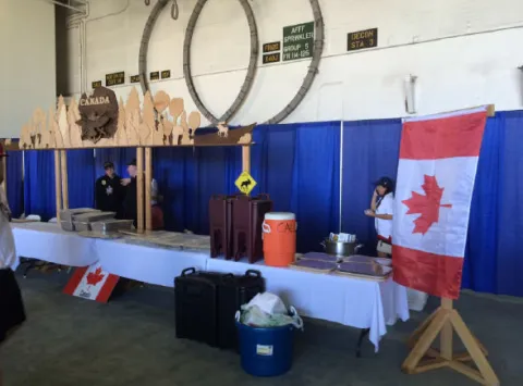 HMCS Vancouver manages a display representing Canada during the international reception at the end of Ex Rim of the Pacific (RIMPAC) on 4 Aug 16. The display was entirely designed and built by Cpl Lee-Ann Smith, a construction engineering technician with 2 Wing. // NCSM Vancouver utilise un présentoir représentant le Canada durant la réception internationale de clôture de l’exercice Rim of the Pacific (RIMPAC) le 4 août 2016. Le présentoir a été entièrement dessiné et fabriqué par la Cpl Lee-Ann Smith, tech