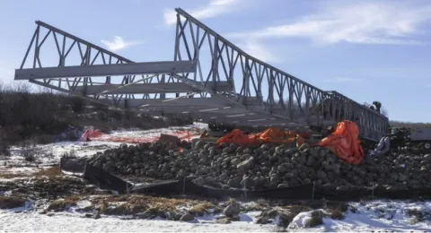 The new bridge is launched across the Battle River // Le nouveau pont enjambe la rivière Battle.